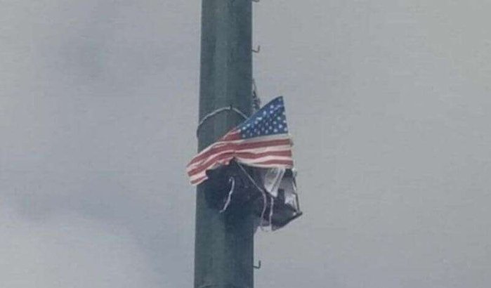 Marokko: man dreigt met zelfmoord vanop elektriciteitspaal met Amerikaanse vlag 