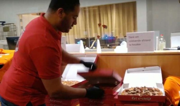 Belgische Marokkaan deelt gratis pizza's uit aan zorgpersoneel (video)