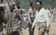 Hassan II bezocht werf in korte broek