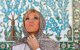 Vrouw Franse President draagt sjaaltje van Marokkaanse ontwerper in Abu Dhabi (foto's)